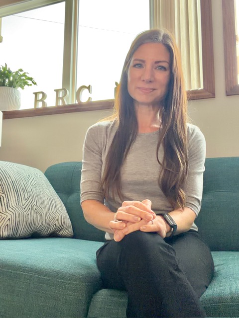 Lisa Medvetz seated in her counseling office